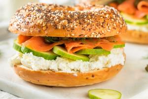Photo of bagel sandwich with cream cheese and veggies