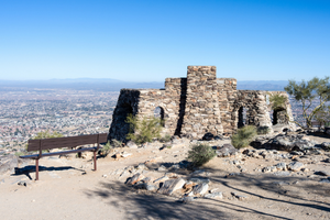 Photo of South Mountain Park in Arizona - bench next to ruins overlooking the city