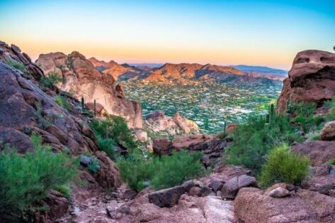 Stock image taken on Camelback Mountain with a green desert view of plants and mountains