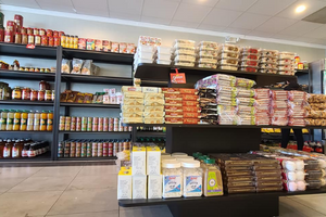 photo of a kosher market stocked shelves with a variety of products