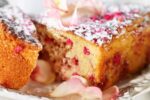 photo of a cake with rosewater and sprinkled with rose petals