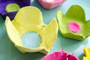 photo of egg carton flowers painted in a variety of colors