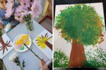 photo of a table with a bouquet of flowers and kids painting with the flowers and the finished art project