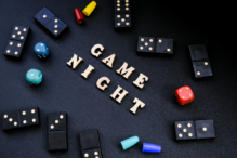 Stock Image of dice with letters spelling game night