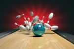 Image of a bowling ball hitting bowling pins