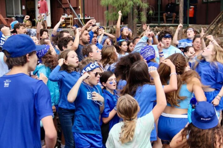 photo of campers in blue dressed up for color wars at Jewish summer camp
