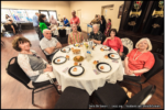 Image of a group of seniors having Shabbat dinner