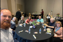 Image of a group of seniors eating lunch together