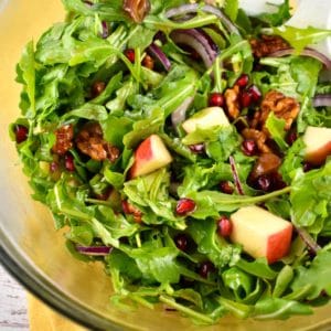 image of a pomegranate, apple, date salad