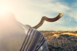 Man blowing shofar in Israel
