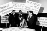 Placards bearing the words of Hebrew prophets and the Old Testament are being readied at the Religious Action Center of the Union of American Hebrew Congregations in Washington on Aug. 27, 1963, in preparation for the March on Washington. (UPI)